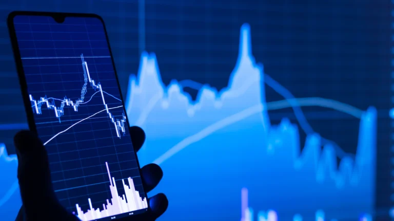 Financial chart application being checked on a mobile device